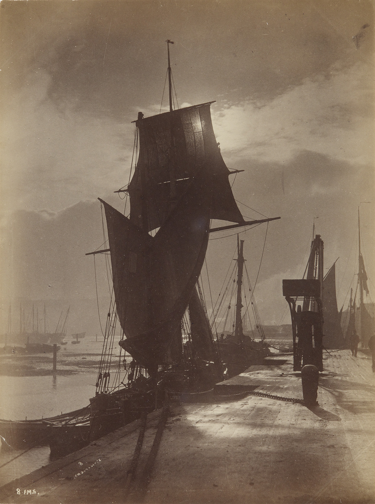 FRANCIS MEADOW SUTCLIFFE (1853-1941) Album with 64 photographs documenting Whitby, England, including the harbor and its occupants.